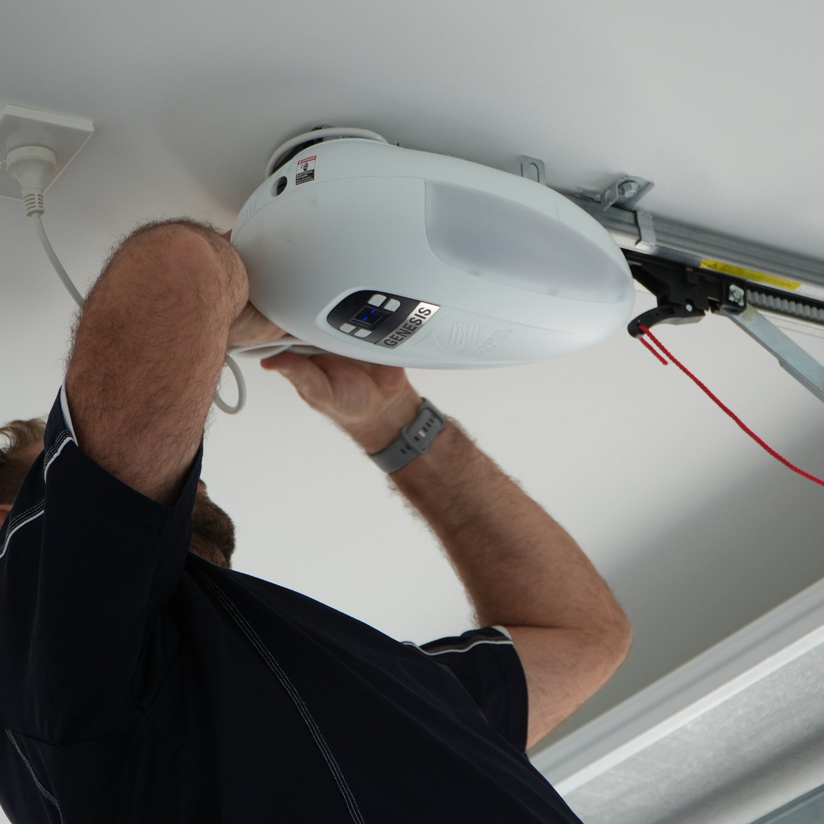 Technician testing automation equipment to meet compliance standards